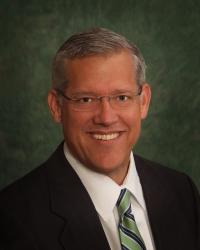 A portrait photo of Brett Ruddell